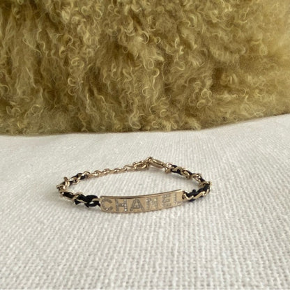 CHANEL Goldtone Chain And Crystal Logo ID Bracelet