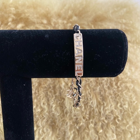 CHANEL Goldtone Chain And Crystal Logo ID Bracelet